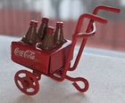 Vintage COCA-COLA 4 Pack. BOTTLES. HAND TRUCK. PUSH CART. MINIATURE 2” LONG