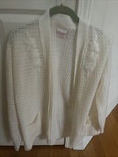 Knitted women s white cardigan, medium