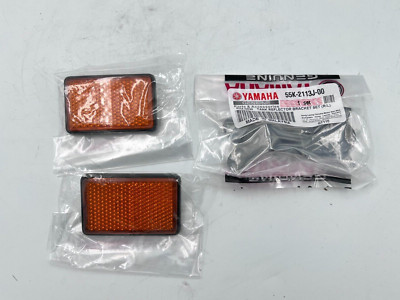 NEW YAMAHA 135 RXK RX135 RX-King TANK FORK REFLECTOR BRACKET SIDE LAMP MARKER