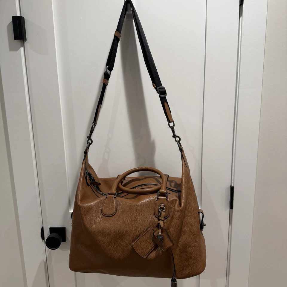 Bolso de fin de semana Coach Navigator de cuero guijarro tostado/marrón bloqueo/llave y correa Foto 2 de 4