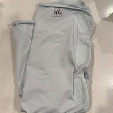 The Ollie Swaddle Adjustable Baby Wrap Light Blue Moisture Wicking Jersey