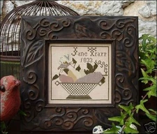 A SAMPLER FRAGMENT-CROSS STITCH-CARRIAGE HOUSE