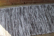 Woven Rug Large Hand Made Rag rug Black Hemmed with rust Yarn