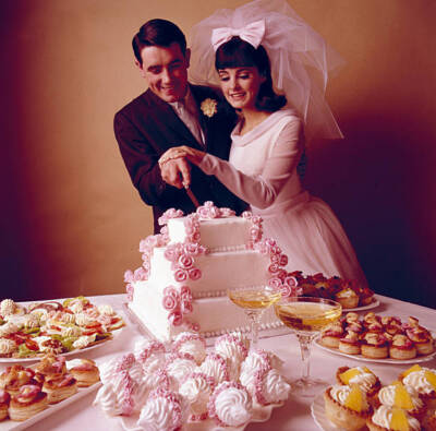 Just Married Couple Cut A Tiered Wedding Cake On A Buffet Tabl 1960s Old Photo
