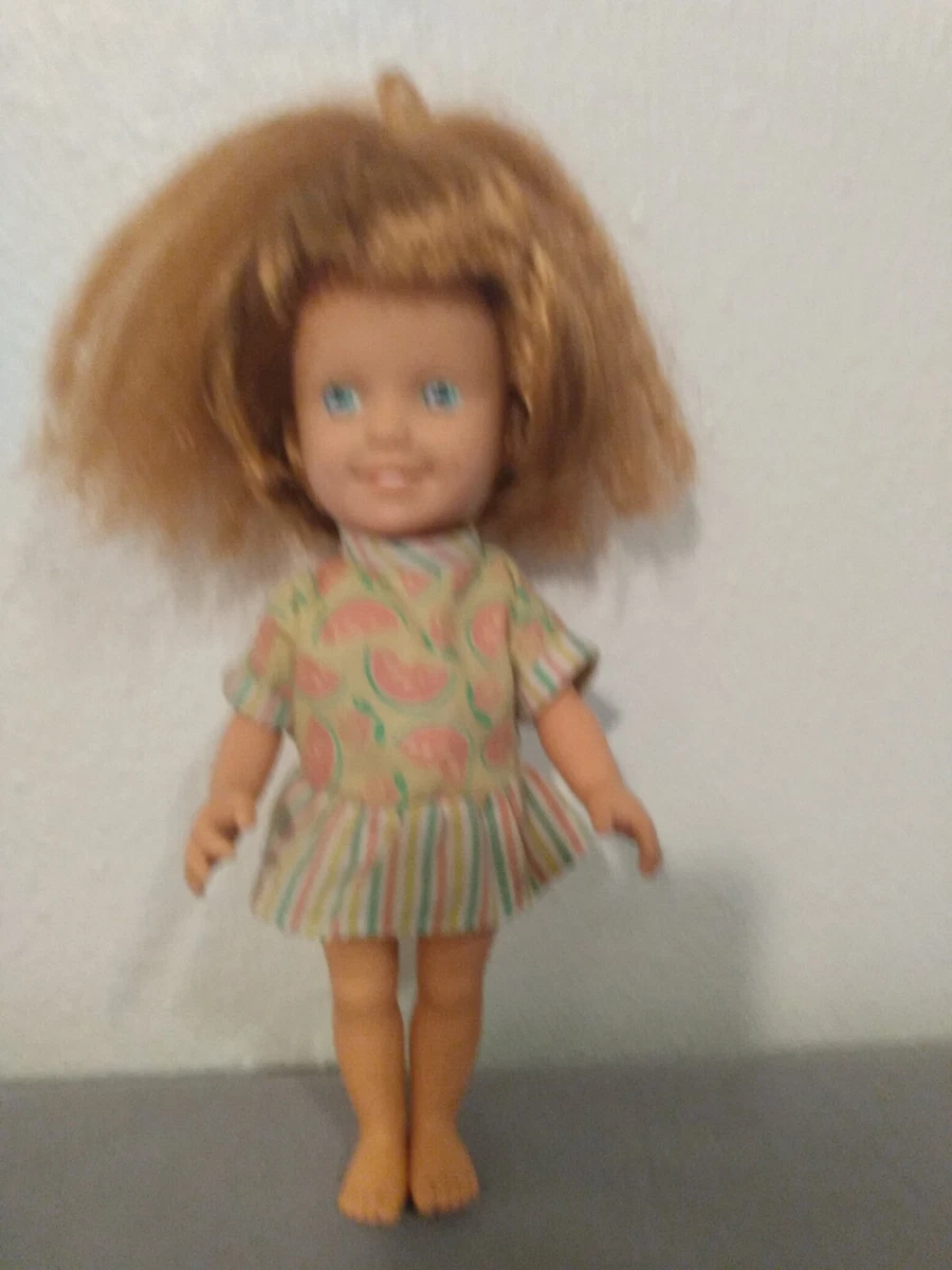 Doll with sale retractable hair