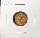 Photo of a 1886-P Gold Dollar from an eBay listing that sold on May 3, 2026