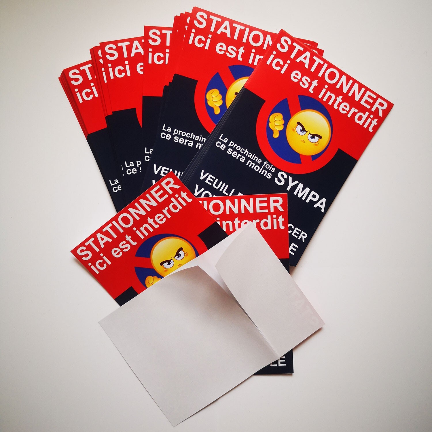 Parking prohibited stickers. Sold in lot of 25 copies.