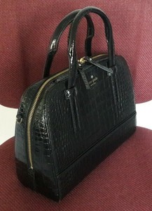 glossy leather bag