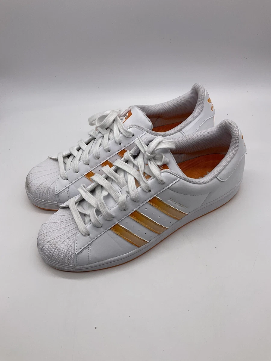 Superstar adidas orange sale