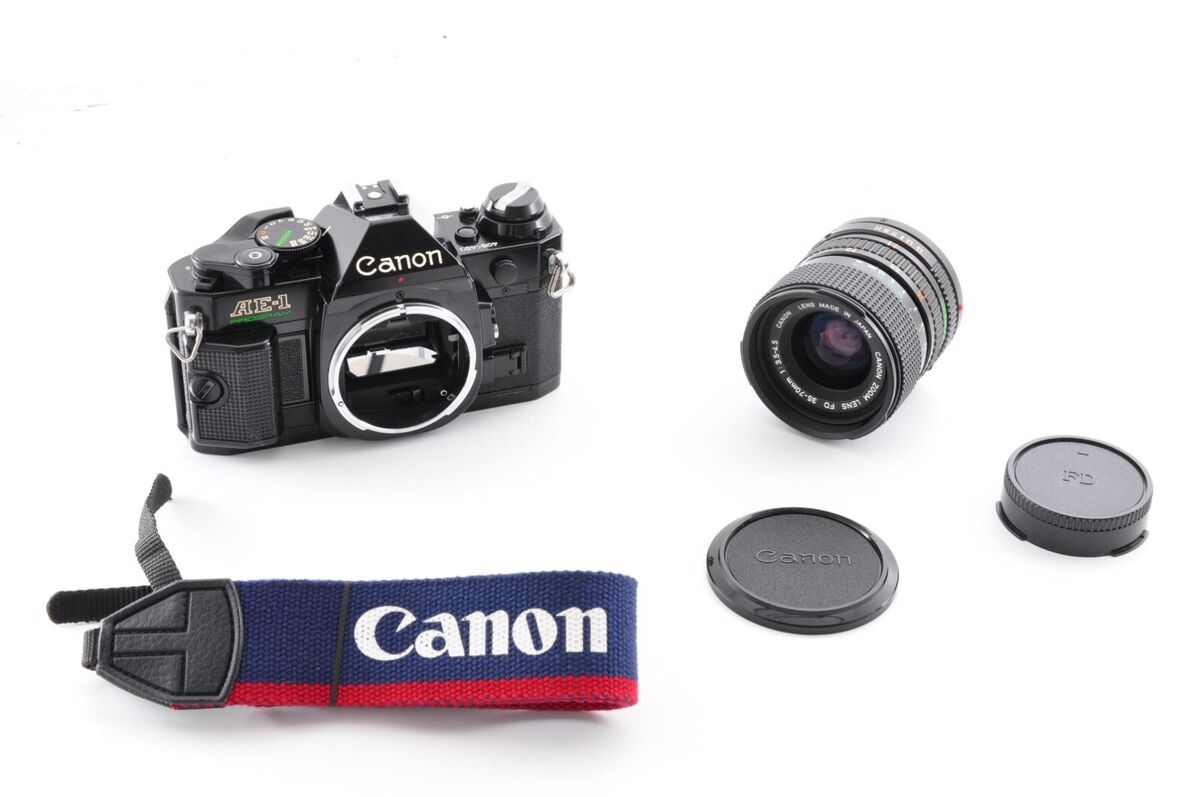 Canon AE-1 Program Black / Lens New FD 35-70mm f/3.5-4.5 Exc Canon AE-1 Program Black / Lens New FD 35-70mm f/3.5-4.5 Exc