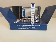 IXO 1/43 Peugeot 206 Gronholm/Rautiainen - 2002 Rally World Champions - RAM095