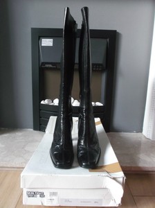 skin tight leather knee high boots