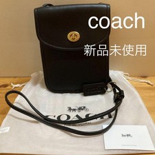 coach turn lock flat crossbody black