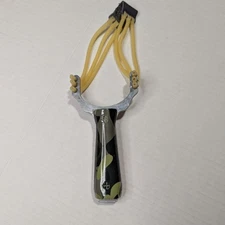 High Velocity Slingshot Camouflage Ergonomic ABS Grip 15 Meters Range Compact