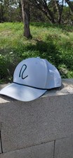 White Adjustable Baseball Cap Hat with R Logo...