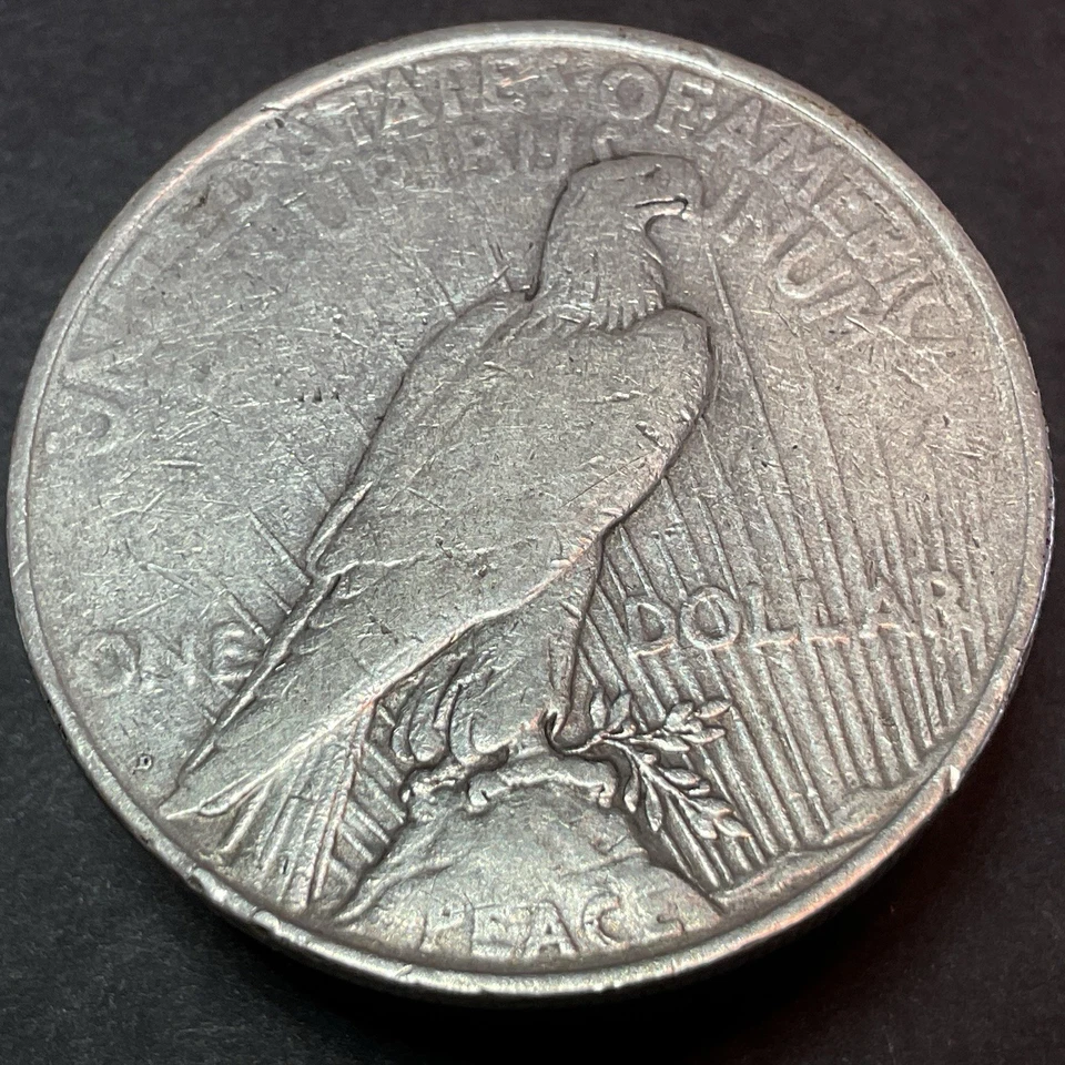 Dólar de plata Peace 1927-D - Error de freno de troquel anverso Foto 2 de 4