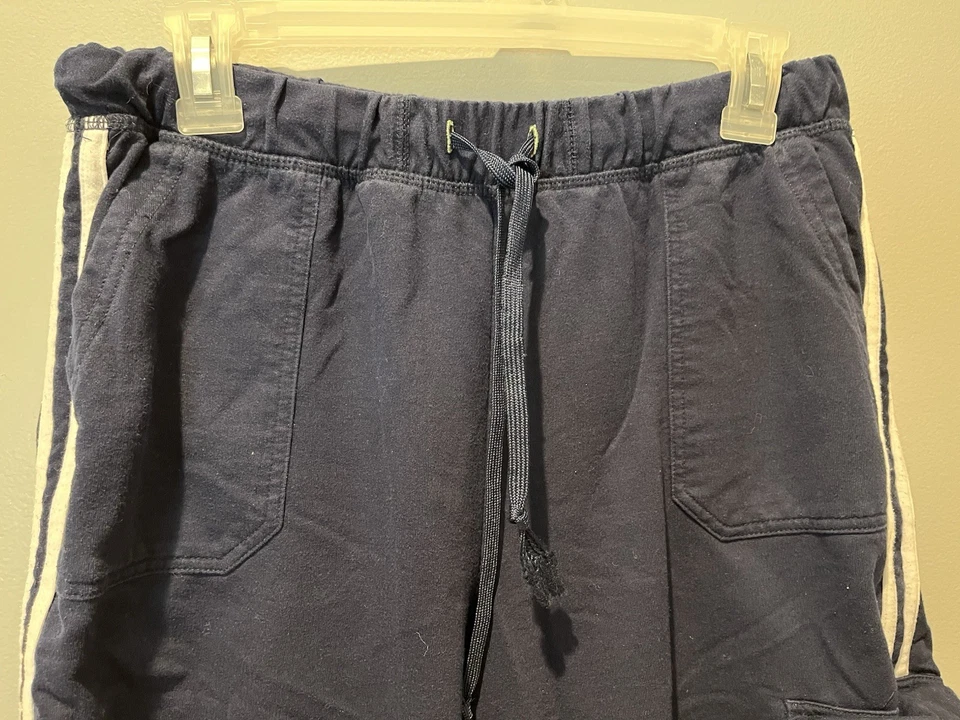 Capris para mujer marca Tangerine azul marino con rayas laterales blancas talla L Foto 2 de 4