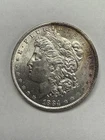 1884 o Morgan Silver Dollar $1 Circulated Toning 0.9 Fine Silver Coin