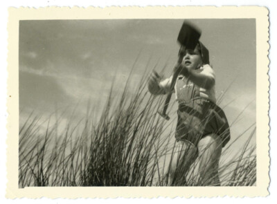 vintage 1950 snapshot photo - The wind at the sea - childhood holidays movement