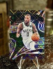 2024-25 Panini Revolution DAMIAN LILLARD #/99 Showstoppers COSMIC Bucks Blazers