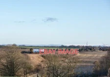 PHOTO  SCOTRAIL LIVERIED 156437 IS BETWEEN GRETNA GREEN AND ANNAN WITH THE 11.15