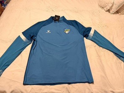 KELME COMUNICACIONES  JACKET 1/4 zip Purple Teal  TORNEO CLAUSURA 2021  XL