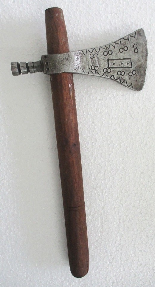 A rare antique axe with decorative detailing on both faces — wall-worthy as rustic art and genuinely one-of-a-kind as a collector's piece.