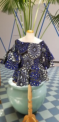 Afrikanische Kleidung für Damen. Gesmocktes elastisches Oberteil.