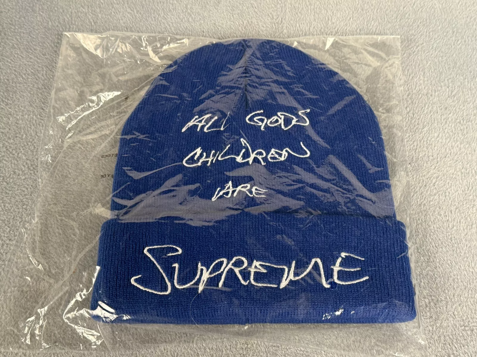 Bonnet bleu royal suprême neuf avec étiquette 