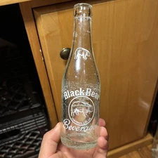Vintage 7oz ACL Black Bear Beverages St Francis Wisconsin Soda Bottle White