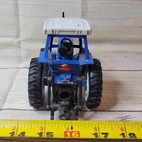 Vintage 1/32 scale Ford TW-5 die-cast/plastic tractor with 3 pt hitch blue/gray - Picture 8 of 9