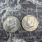 Two (2) 40% Kennedy Half Dollar 1965, 1968D, AU-BU -KH216