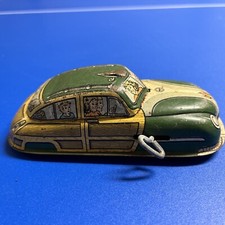 MARX TIN LITHO WIND UP WOODY WOODIE CAR WITH FAMILY LM 52