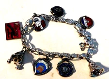 Sterling silver charm bracelet w/8 charms, travel charms, bell (fillagree) space