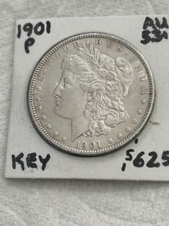 KEY AU 1901 P MORGAN DOLLAR. Just light even wear. Good eye appeal Trends $625