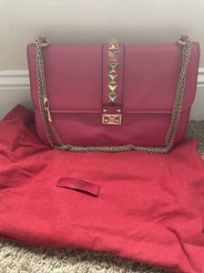 valentino rockstud clutch pink