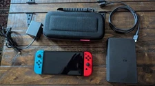 Nintendo Switch/ W Case , Dock, HDMI Cord, Charging Cord.