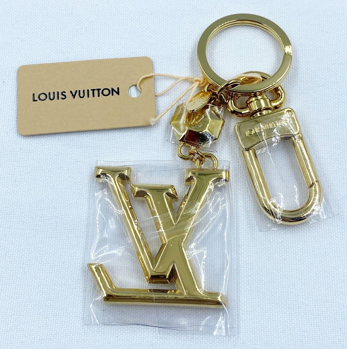 NEW LV LOUIS VUITTON FACETTES GOLD BAG CHARM KEY HOLDER M65216  