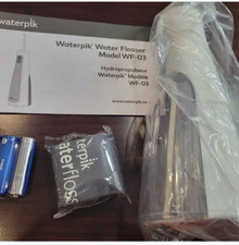 NEW Waterpik Travel size Water Flosser - White