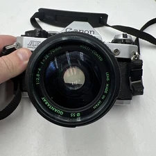 CANON AE-1 PROGRAM SLR 35mm FILM CAMERA w/ QUANTARAY 28-70MM F2.8-4 LENS