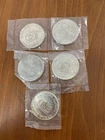 Lot of (5) 1986 Sunshine Mining 1 Troy ounce .999 fine Silver Eagle round