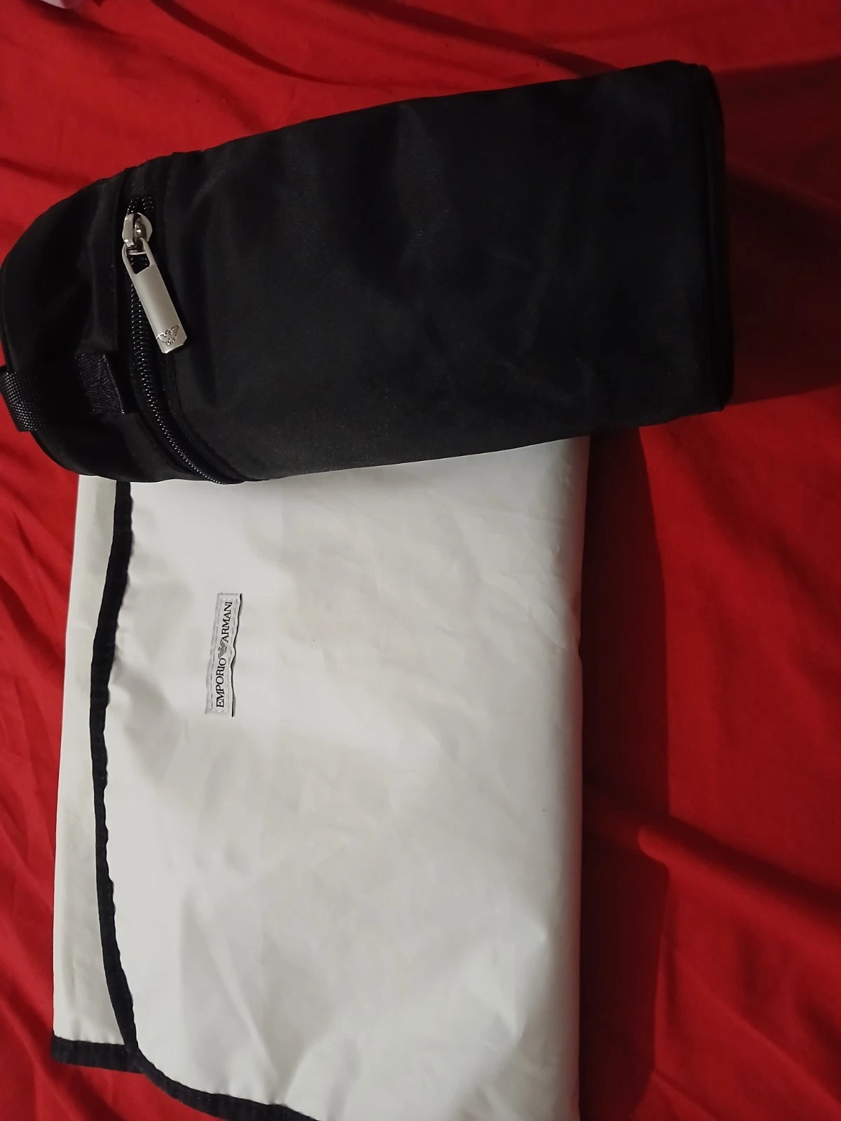 Emporio Armani waterproof changing mat with bottle holder