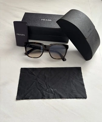 Lunettes de soleil Prada - Photo 1/4