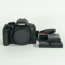 Canon EOS Kiss X9i Digital Camera Body with 2 Batteries and Accessories