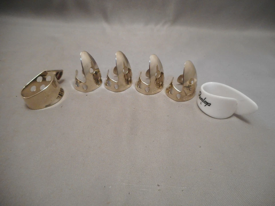 DUNLOP 6 PC LEFT HAND FINGERPICK SET- .018 W/2 THUMBPICKS - Image 2 of 4