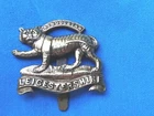 WW1.The Leicestershire Regiment economy issue cap badge.