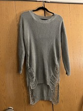 Womens grey sweater dress with frayed detailing on sides/back.
