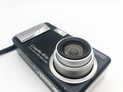 Ricoh Caplio R1 Compact Digital Camera Black AA battery powered