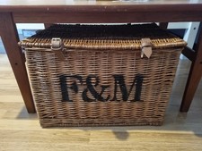 Fortnum & Mason wicker hamper basket with the F&M logo stencilled on the lid.