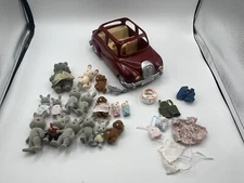 SYLVANIAN FAMILIES CALICO CRITTERS RED CAR WITH ASSORTED ANIMAL DOLLS